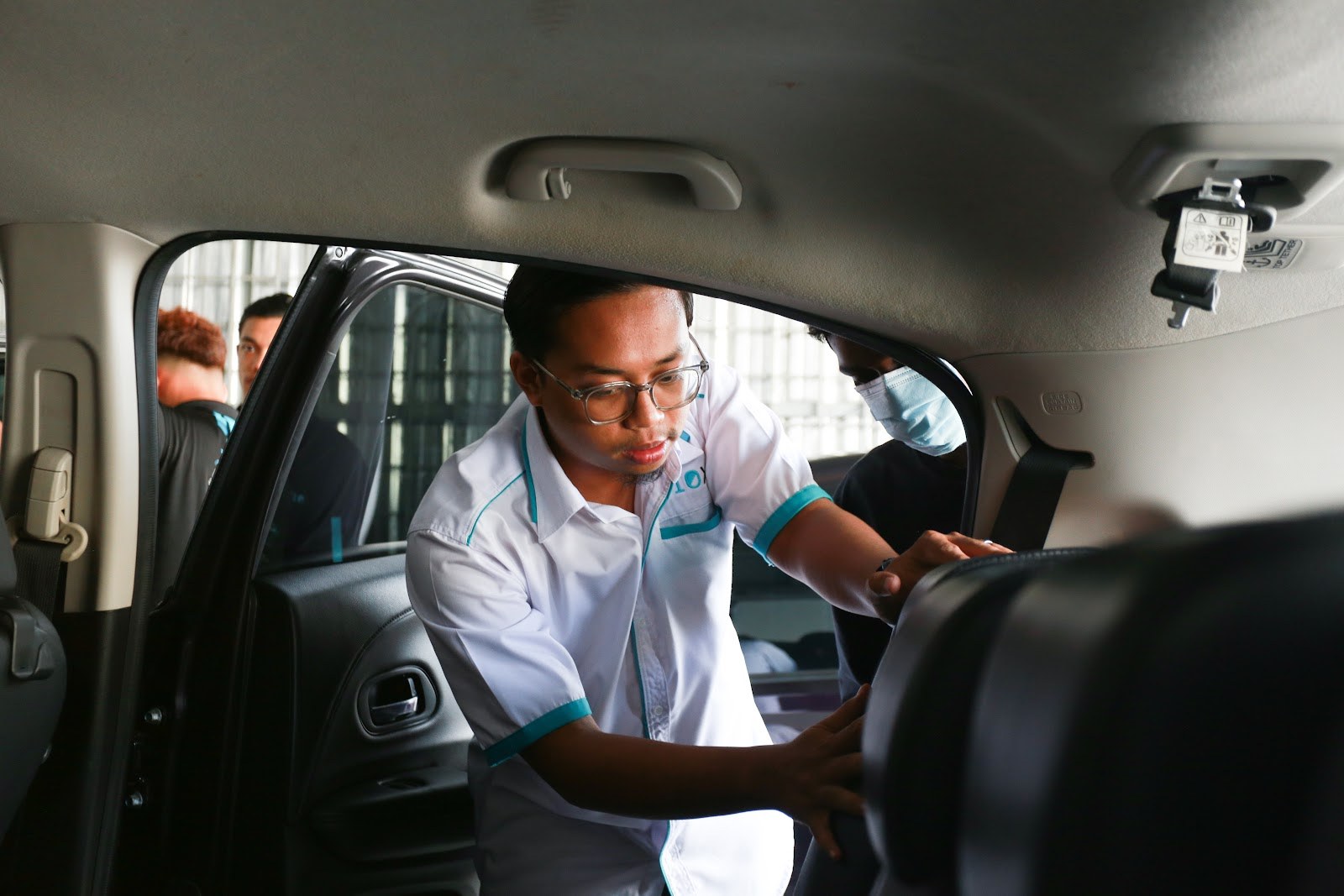 P10X Academy instructor inspecting front seat backrest