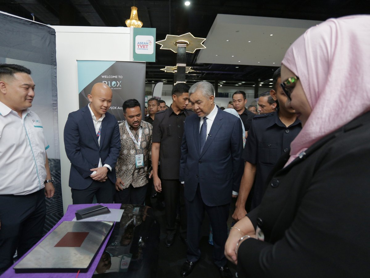 VIP delegation visiting the P10X Academy booth at a TVET expo