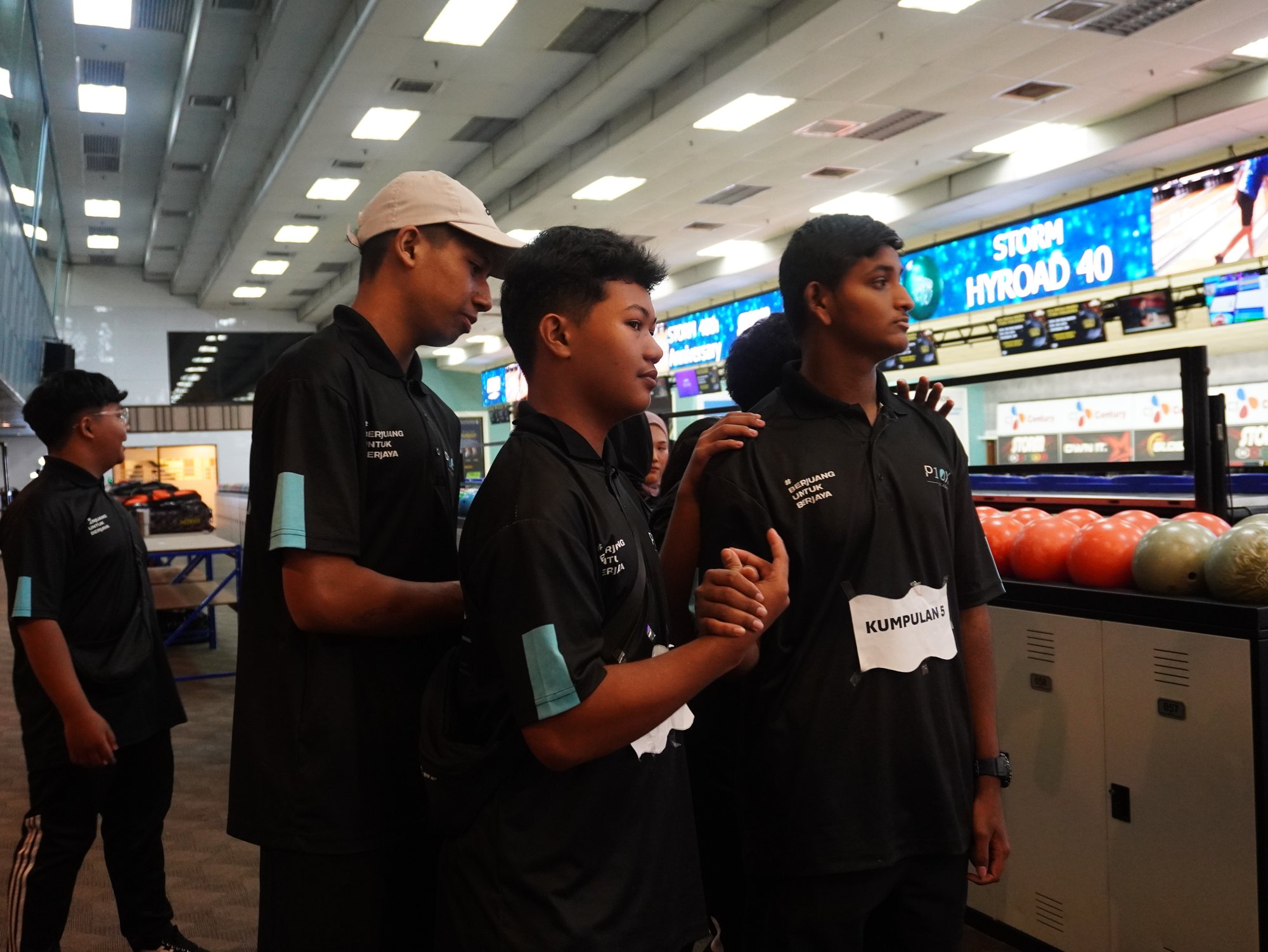 P10X Academy students in academy uniform at a mall event